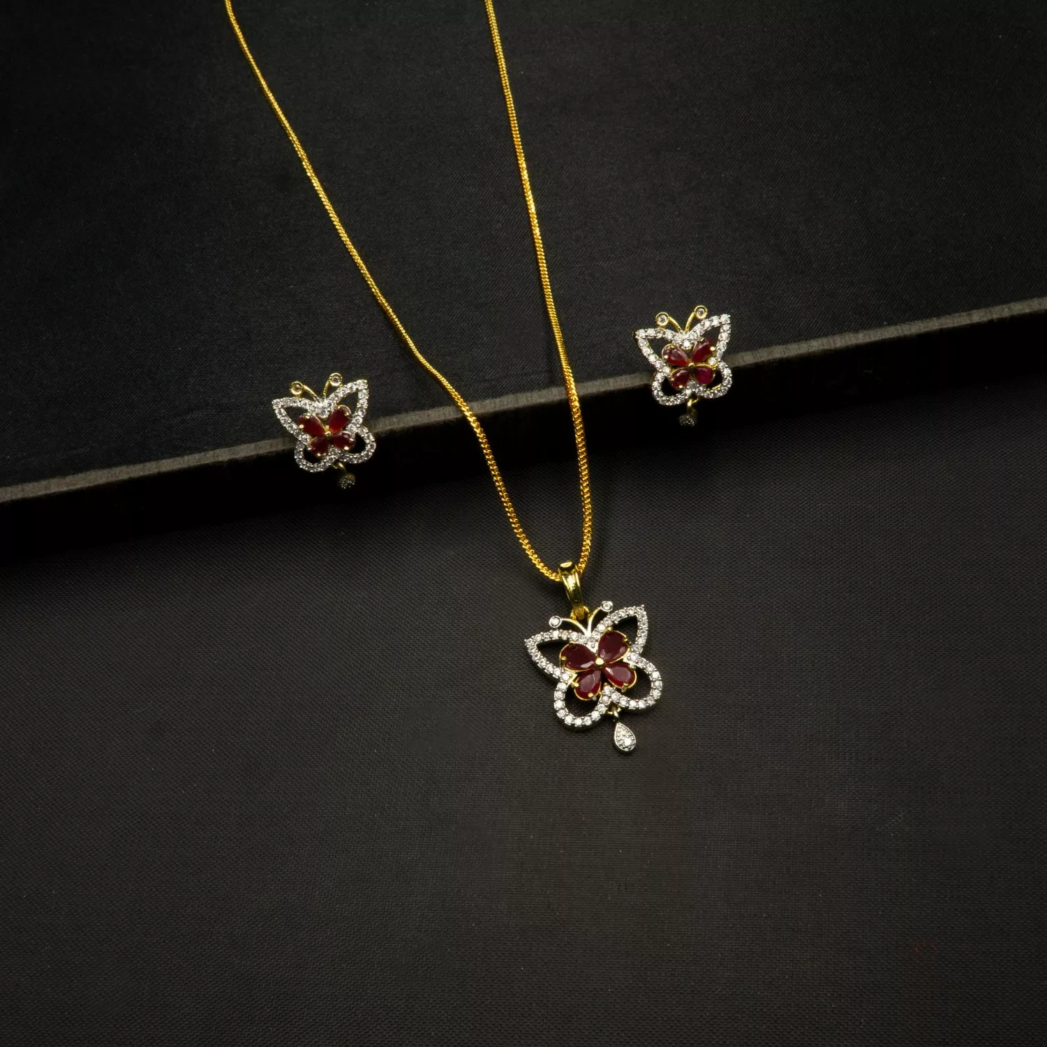 PS-2205003 - American Diamond Studded Ruby Butterfly Pendant Set PS-2205003 - American Diamond Studded Ruby Butterfly Pendant Set