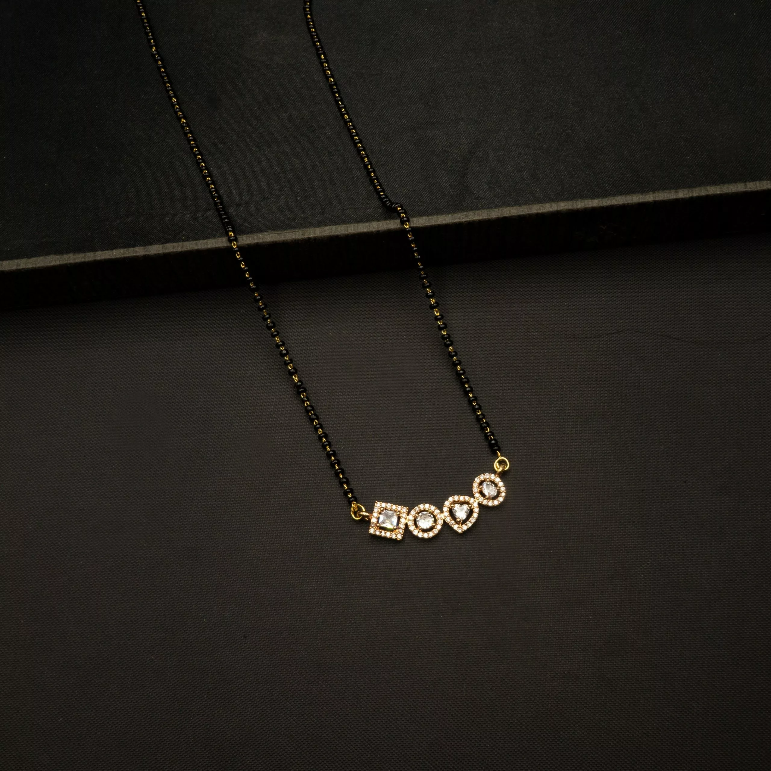 MA-2207006 - American Diamond Contemporary Multi Shapes Mangalsutra MA-2207006 - American Diamond Contemporary Multi Shapes Mangalsutra