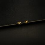 ER-2301004 - American Diamond Bow Tie Stud Earrings