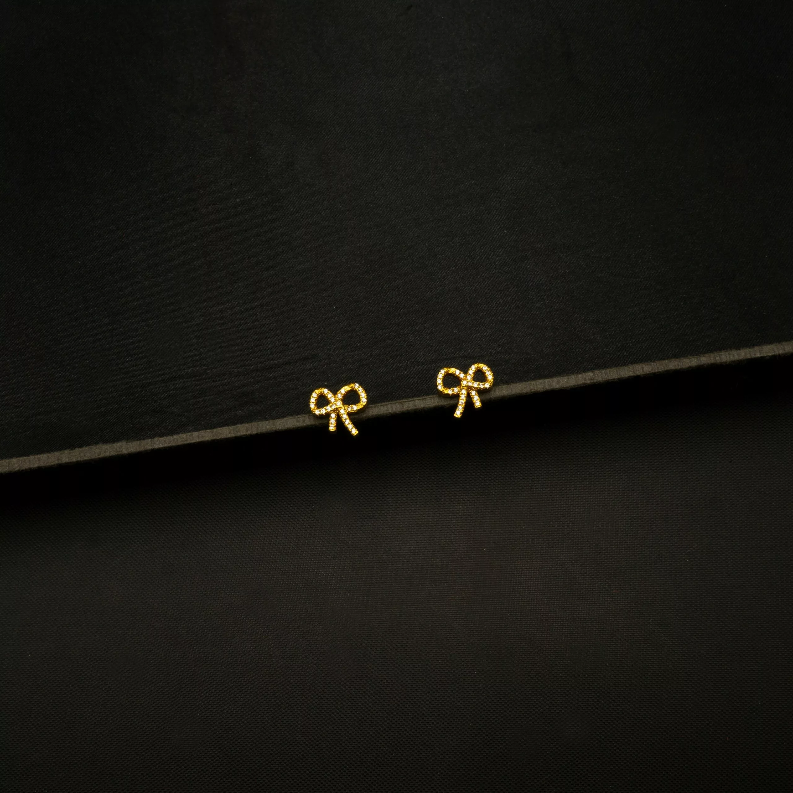 ER-2301004 - American Diamond Bow Tie Stud Earrings ER-2301004 - American Diamond Bow Tie Stud Earrings