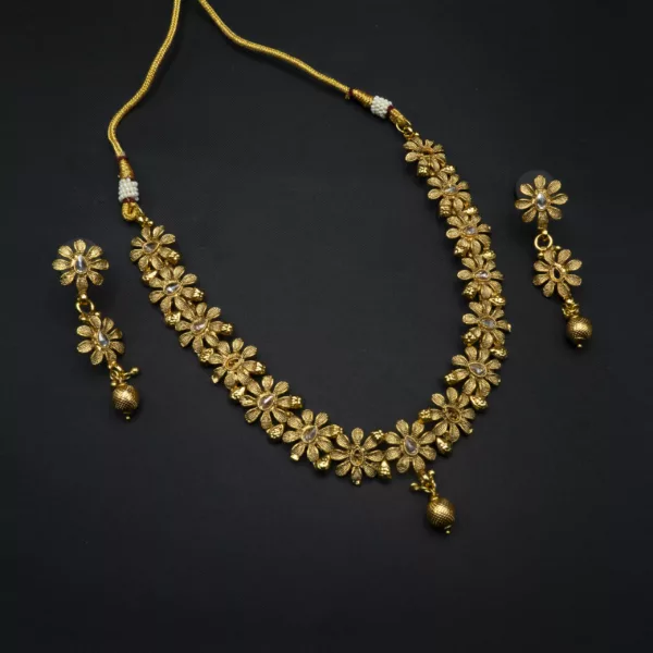 NS-2212030 - Antique Gold Finish Kundan Temple Necklace Set