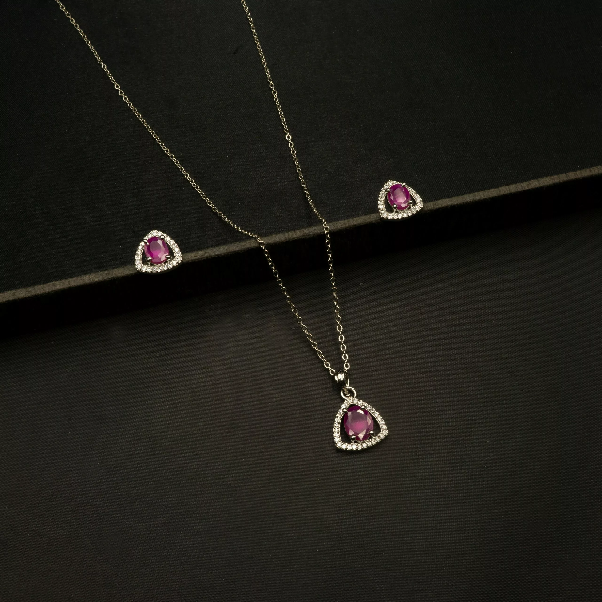 PS-2303011 - White Gold Plated American Diamond & Ruby Triangle Pendant Set