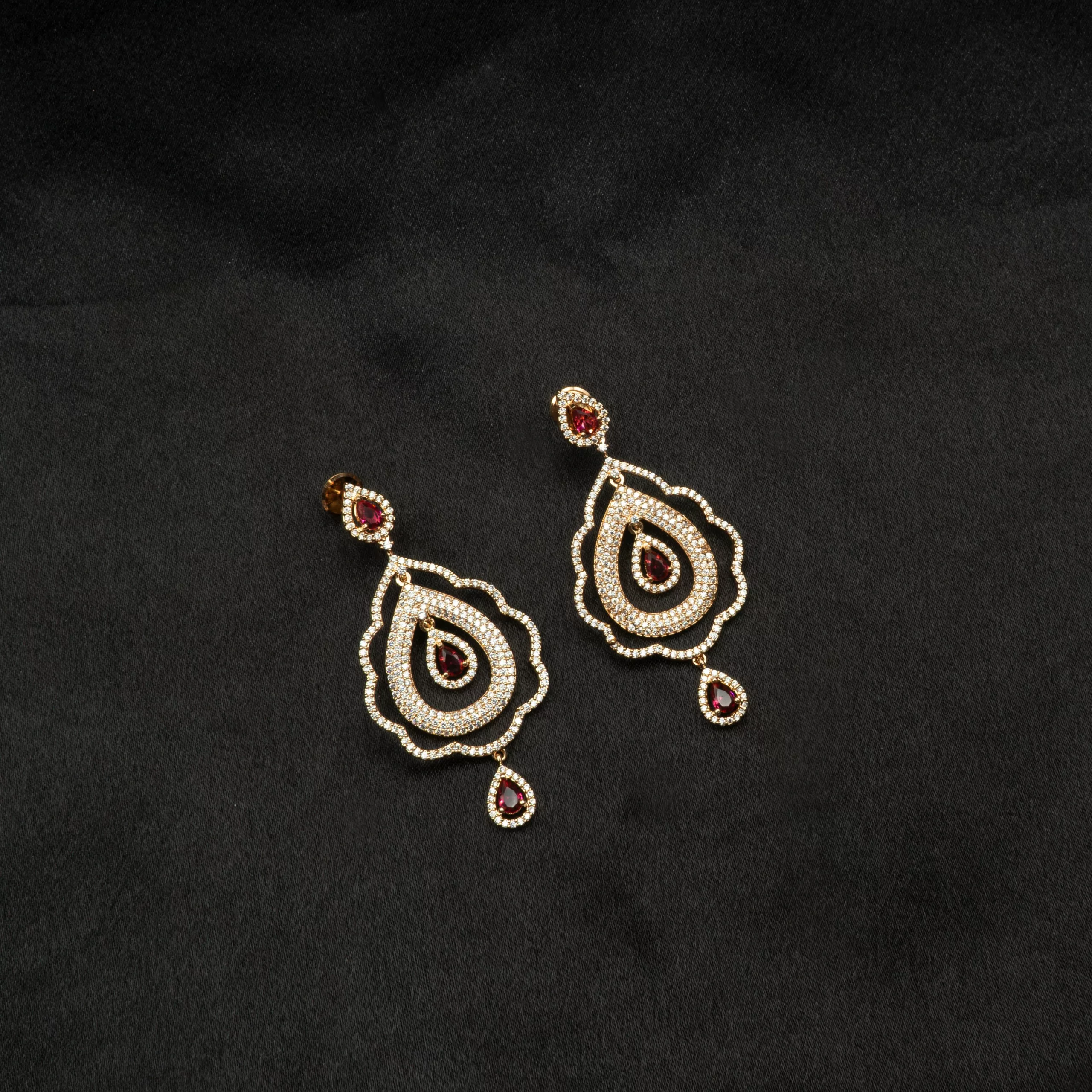 ER-2310003 - Captivating Ruby Teardrops Gold Plated American Diamond Dangling Earrings ER-2310003 - Captivating Ruby Teardrops Gold Plated American Diamond Dangling Earrings