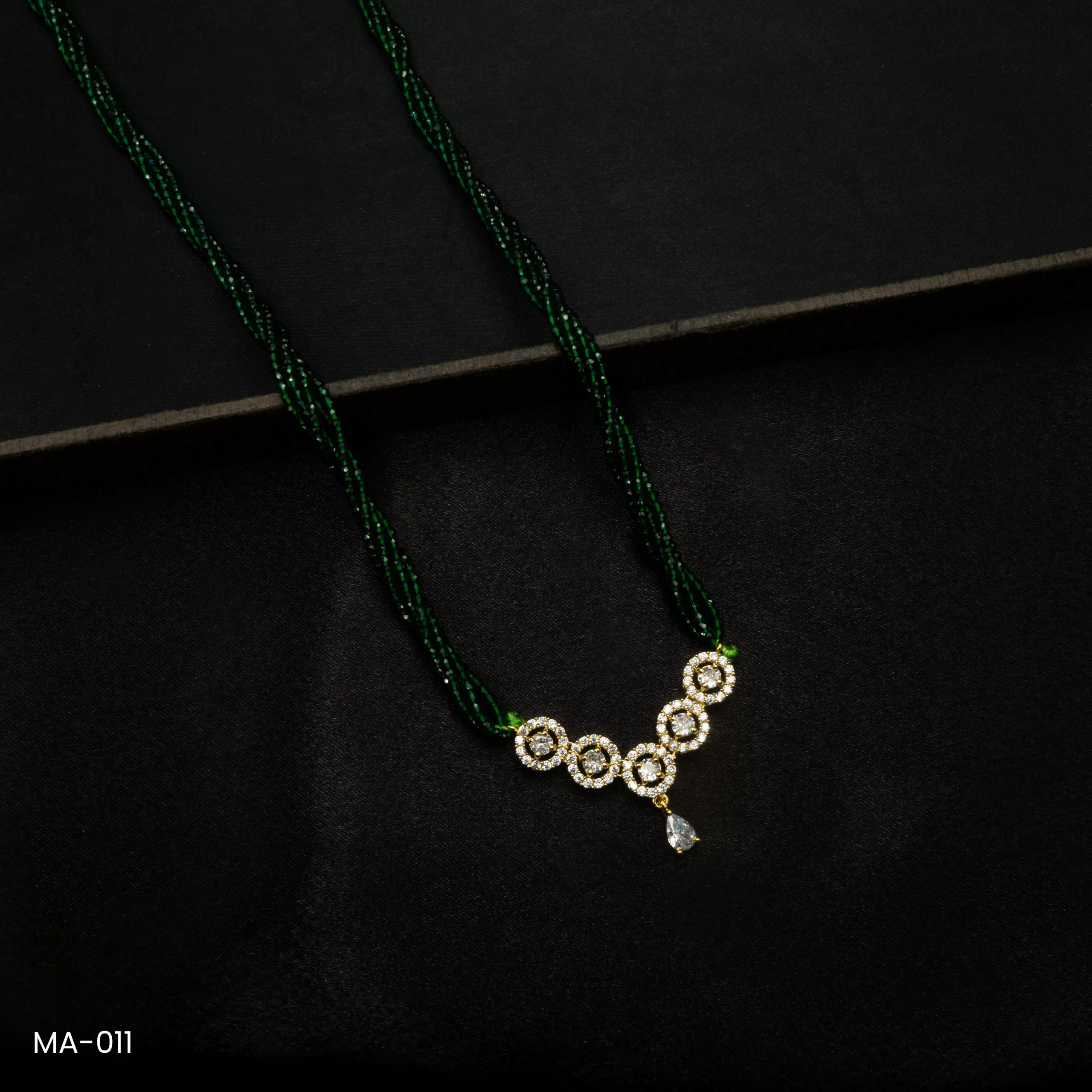 MA-011 - Gold Plated American Diamond Green Long Hydropotey Mangalsutra MA-011 - Gold Plated American Diamond Green Long Hydropotey Mangalsutra