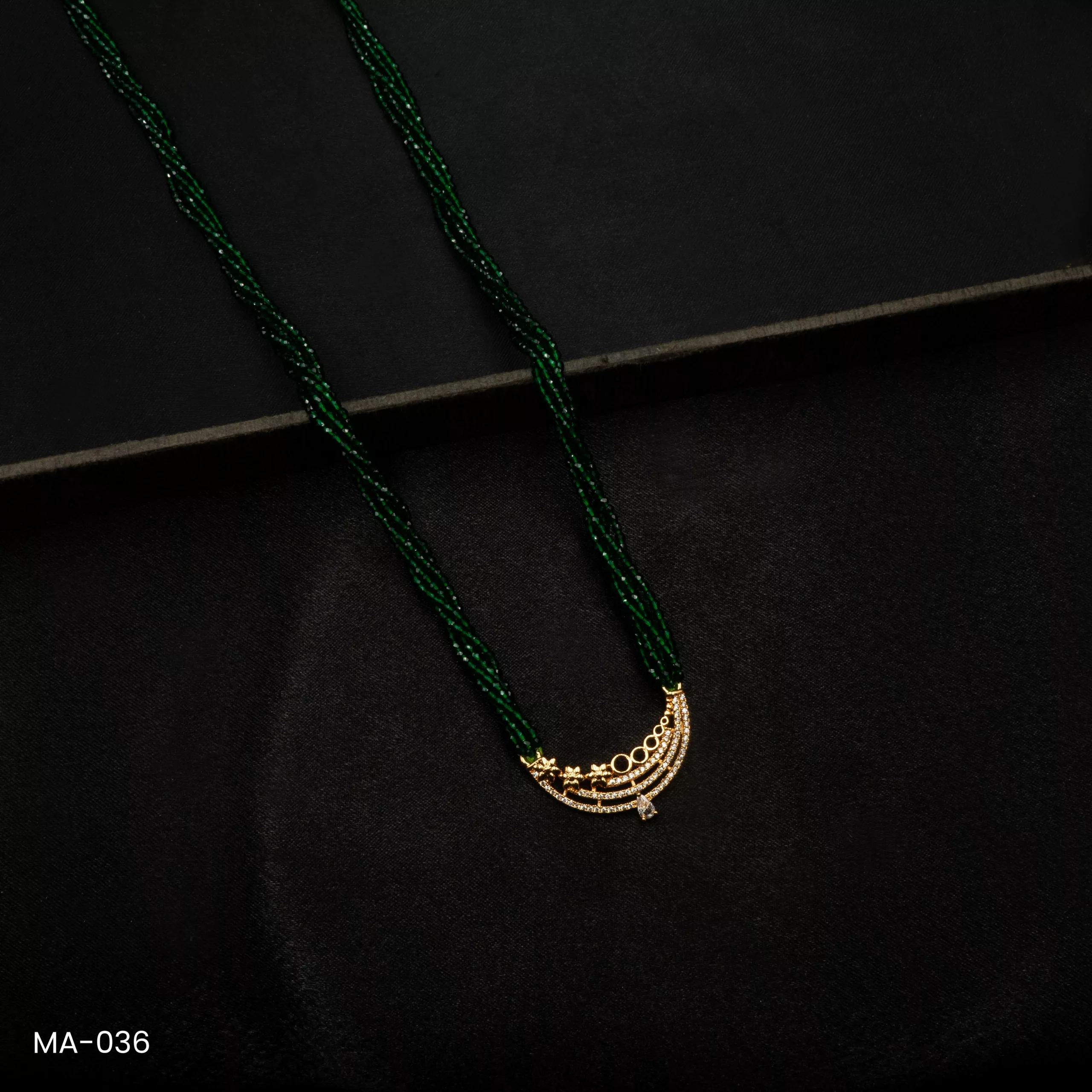 MA-036 - Gold Plated American Diamond Green Long Hydropotey Mangalsutra MA-036 - Gold Plated American Diamond Green Long Hydropotey Mangalsutra