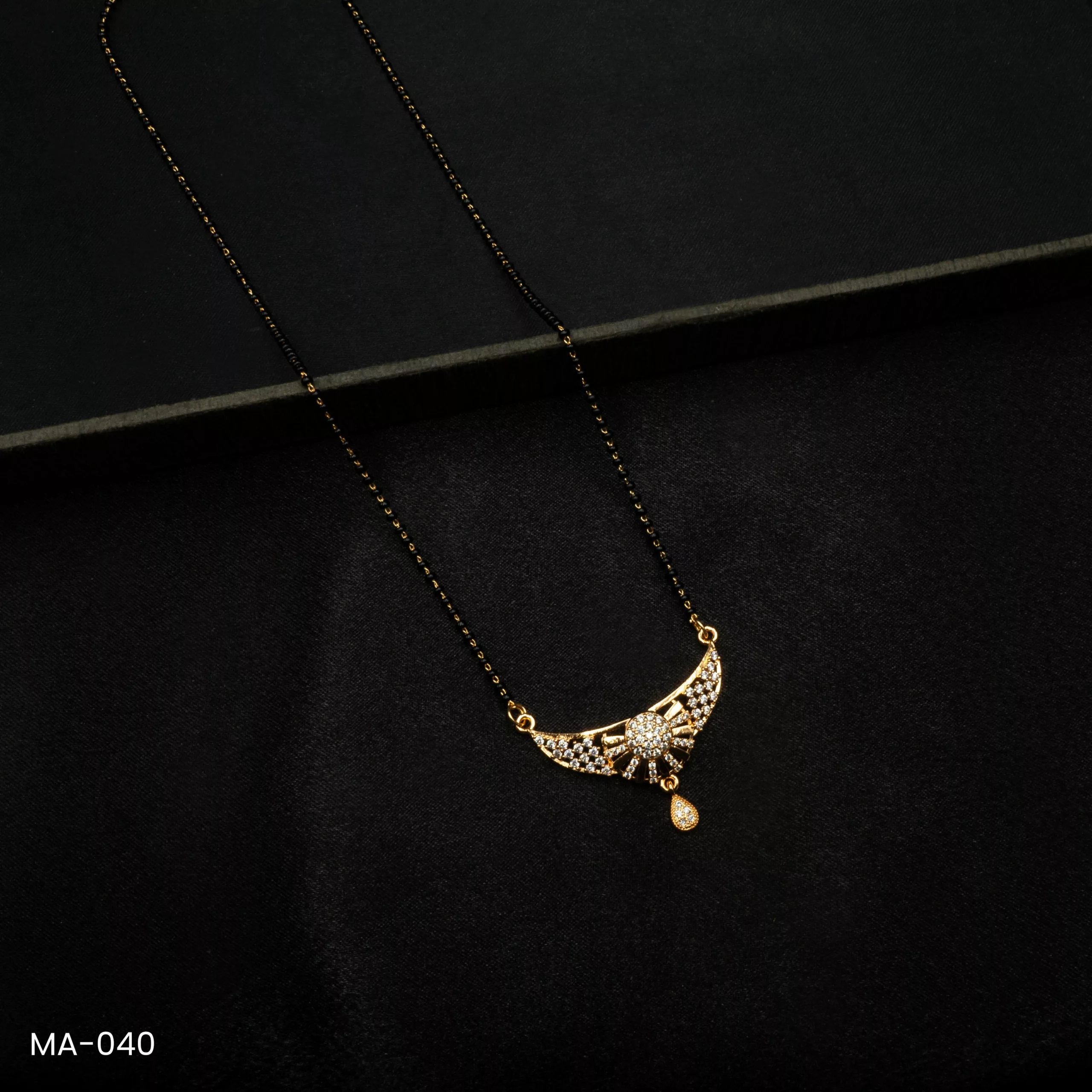 MA-040 - Contemporary Gold Plated American Diamond Mangalsutra MA-040 - Contemporary Gold Plated American Diamond Mangalsutra