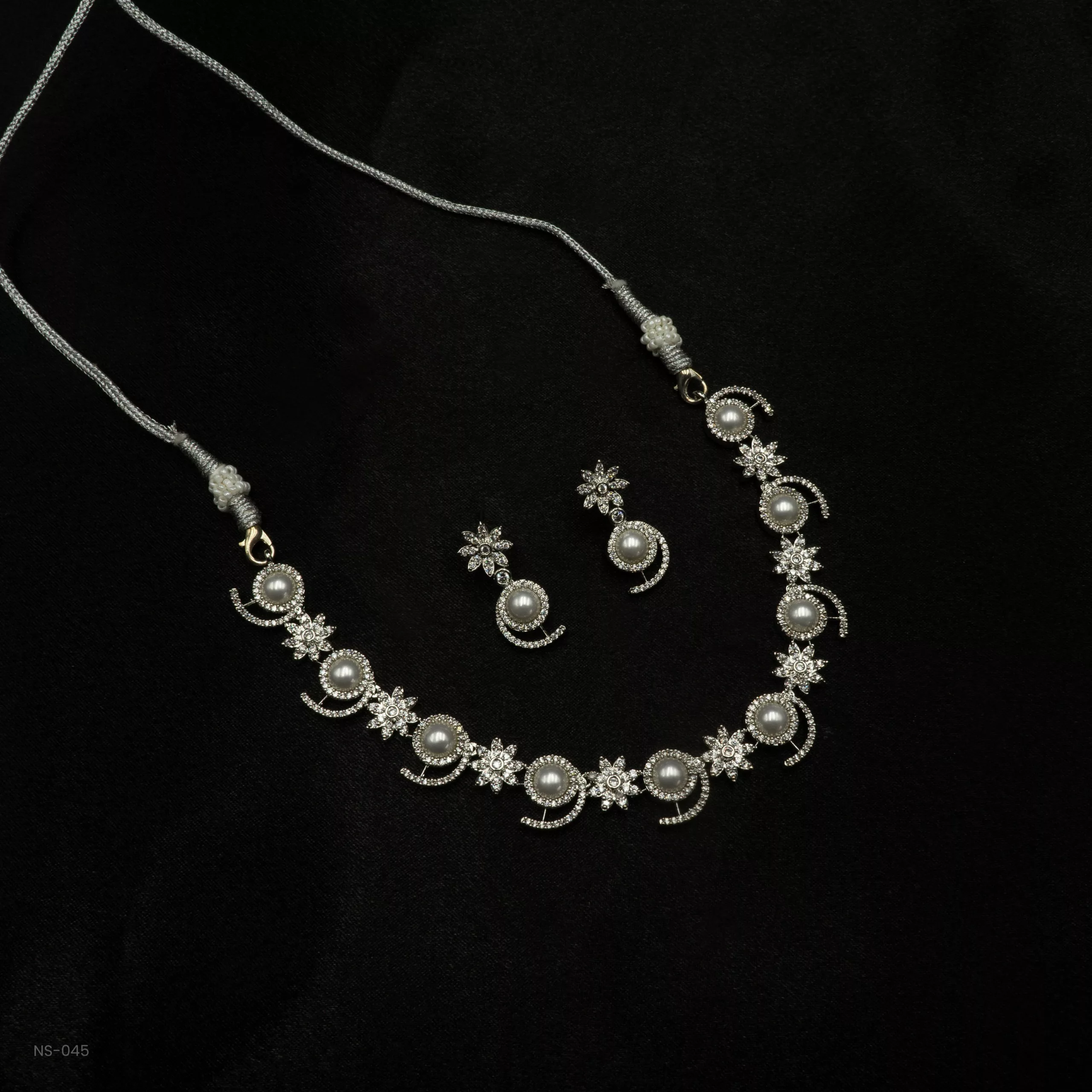 NS-045 - Luminous Luxe Elegant Pearl White Gold Plated Floral American Diamond Necklace Set NS-045 - Luminous Luxe Elegant Pearl White Gold Plated Floral American Diamond Necklace Set