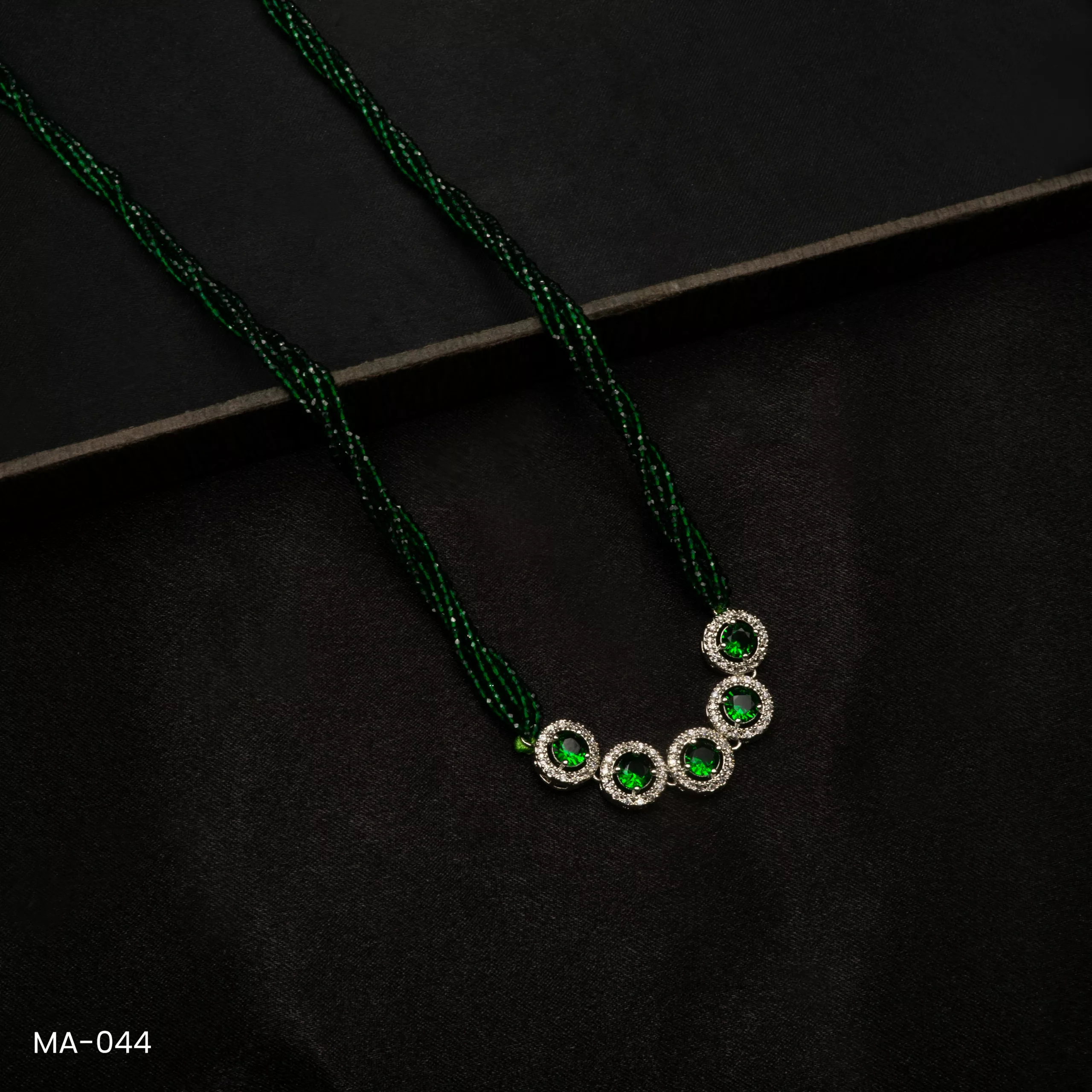 MA-044 - White Gold Plated American Diamond & Emerald Long Green Hydropotey Mangalsutra MA-044 - White Gold Plated American Diamond & Emerald Long Green Hydropotey Mangalsutra