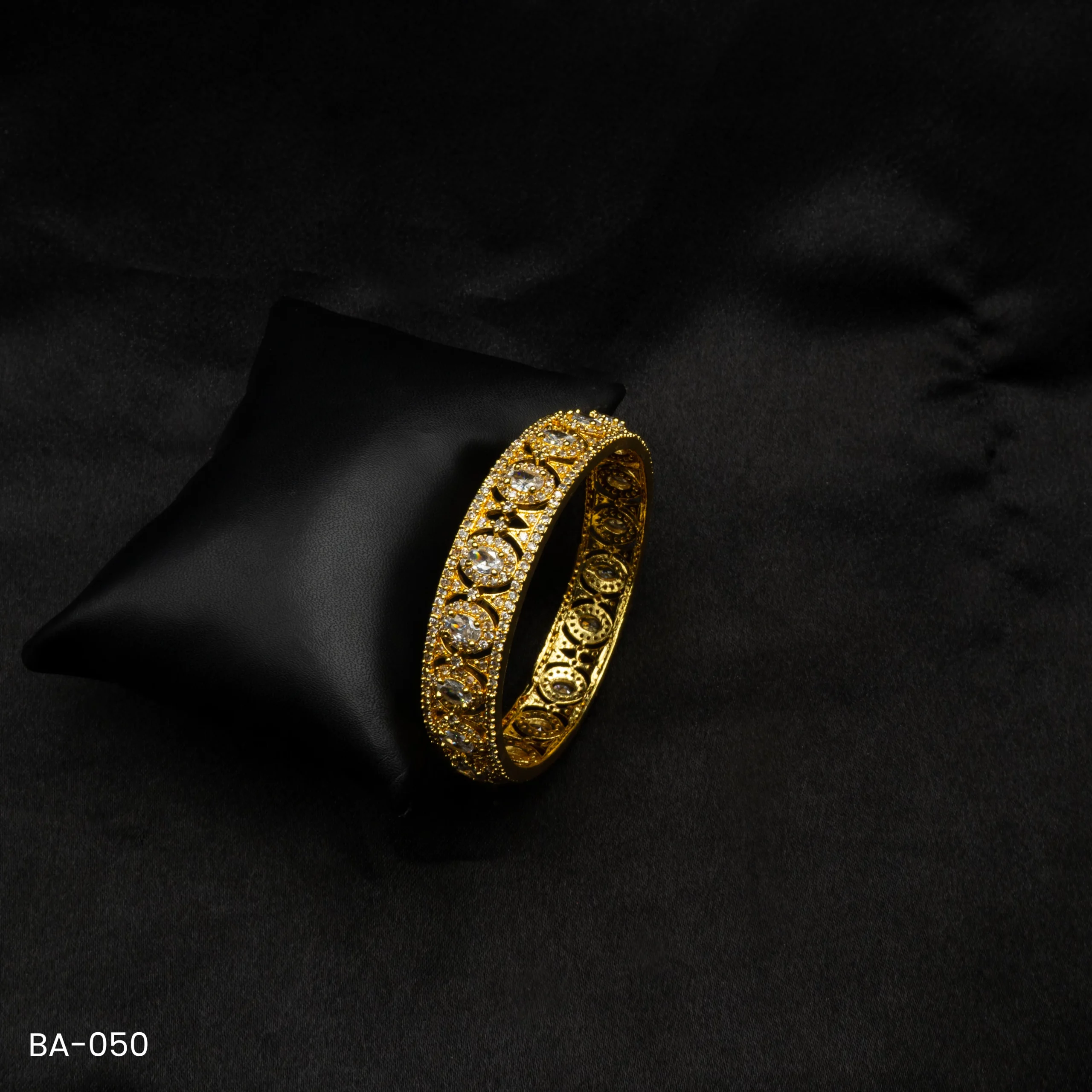 BA-050 - Sophisticated Gold-Toned American Diamond Studded Bangle BA-050 - Sophisticated Gold-Toned American Diamond Studded Bangle