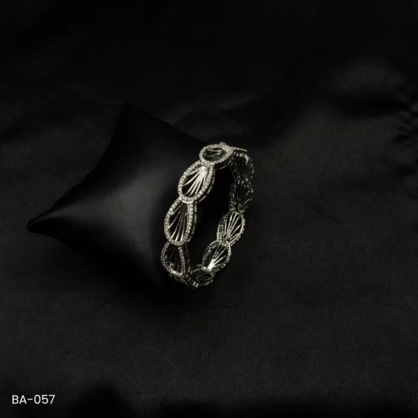 BA-057 - Stylish Sophistication Graceful Oval Pattern American Diamond Bangle