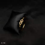 BL-108 - Luxe Twist Gold Plated Bracelet with Elegant American Diamond Embellishments