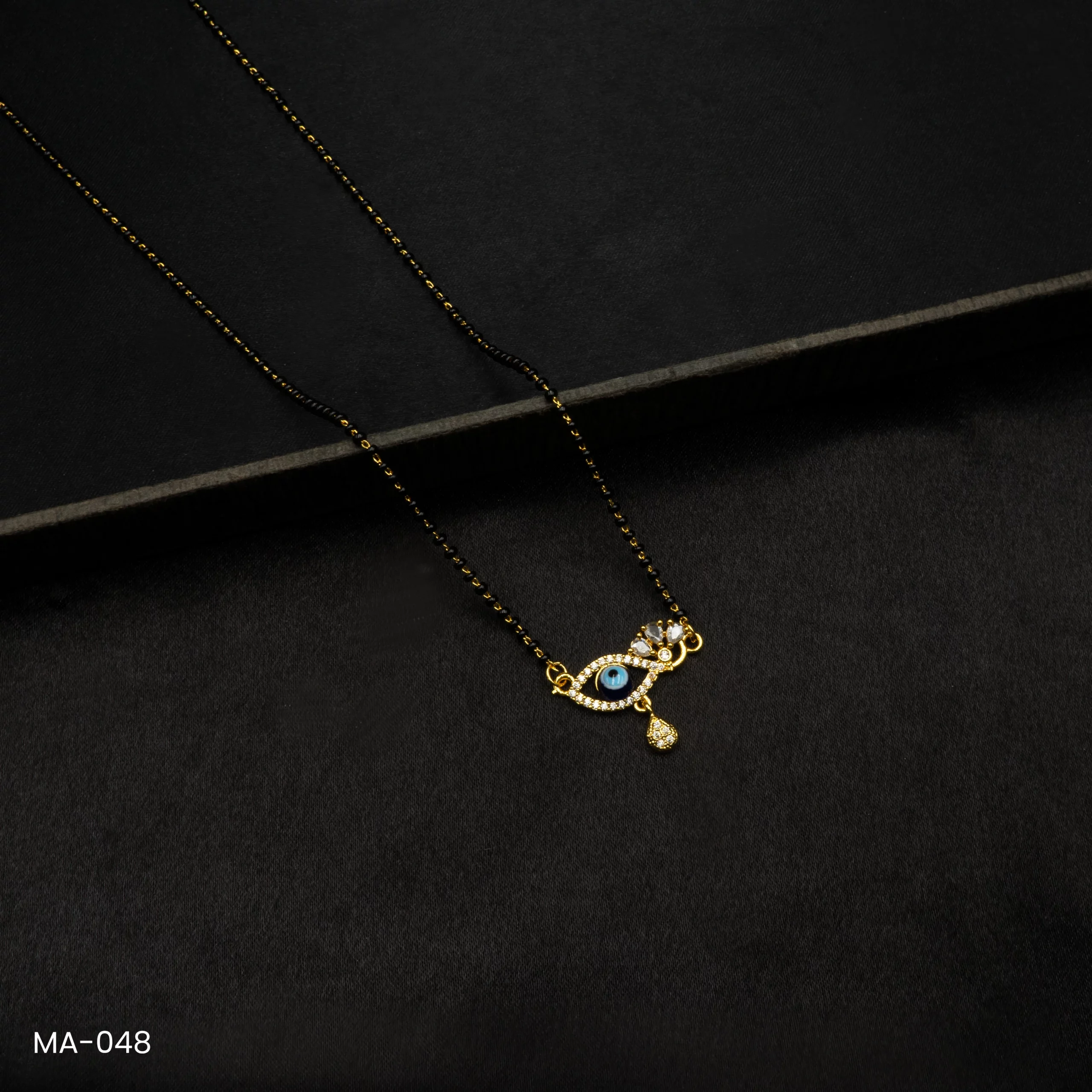 MA-048 - Gold Plated American Diamond Evil Eye Mangalsutra MA-048 - Gold Plated American Diamond Evil Eye Mangalsutra