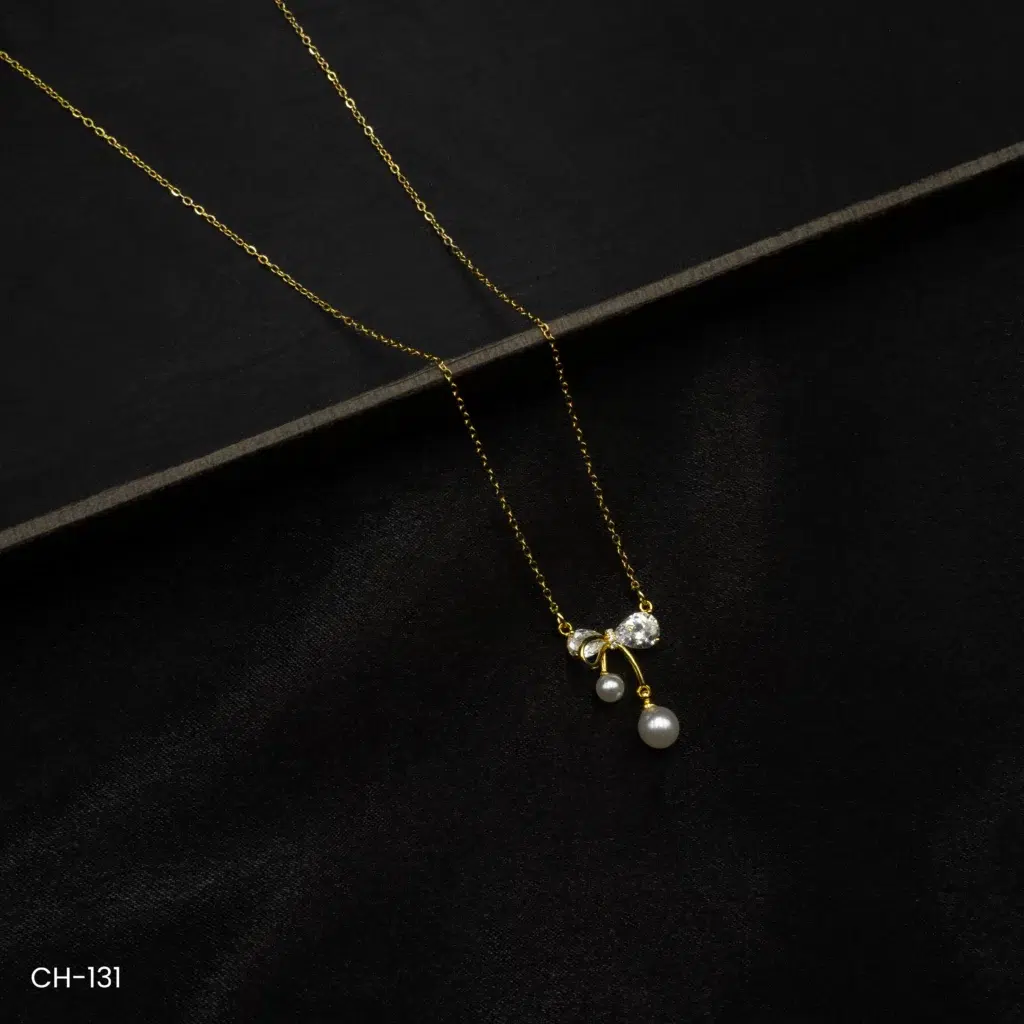 CH-131 – Gold Plated Pearl Drop Classic Bow Design American Diamond Necklace