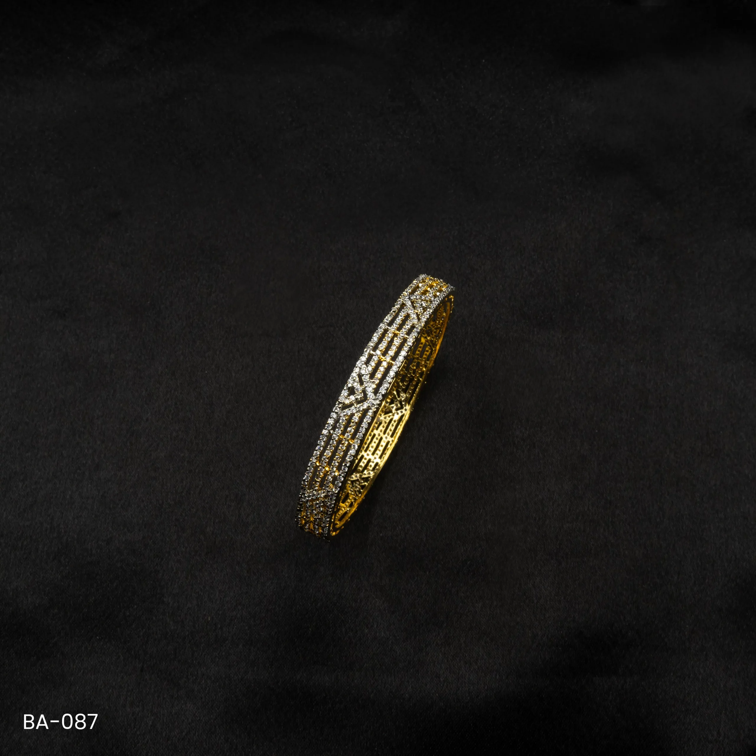 BA-087 - Elegant Gold Plated Bangle With Shimmering American Diamond Stones BA-087 - Elegant Gold Plated Bangle With Shimmering American Diamond Stones