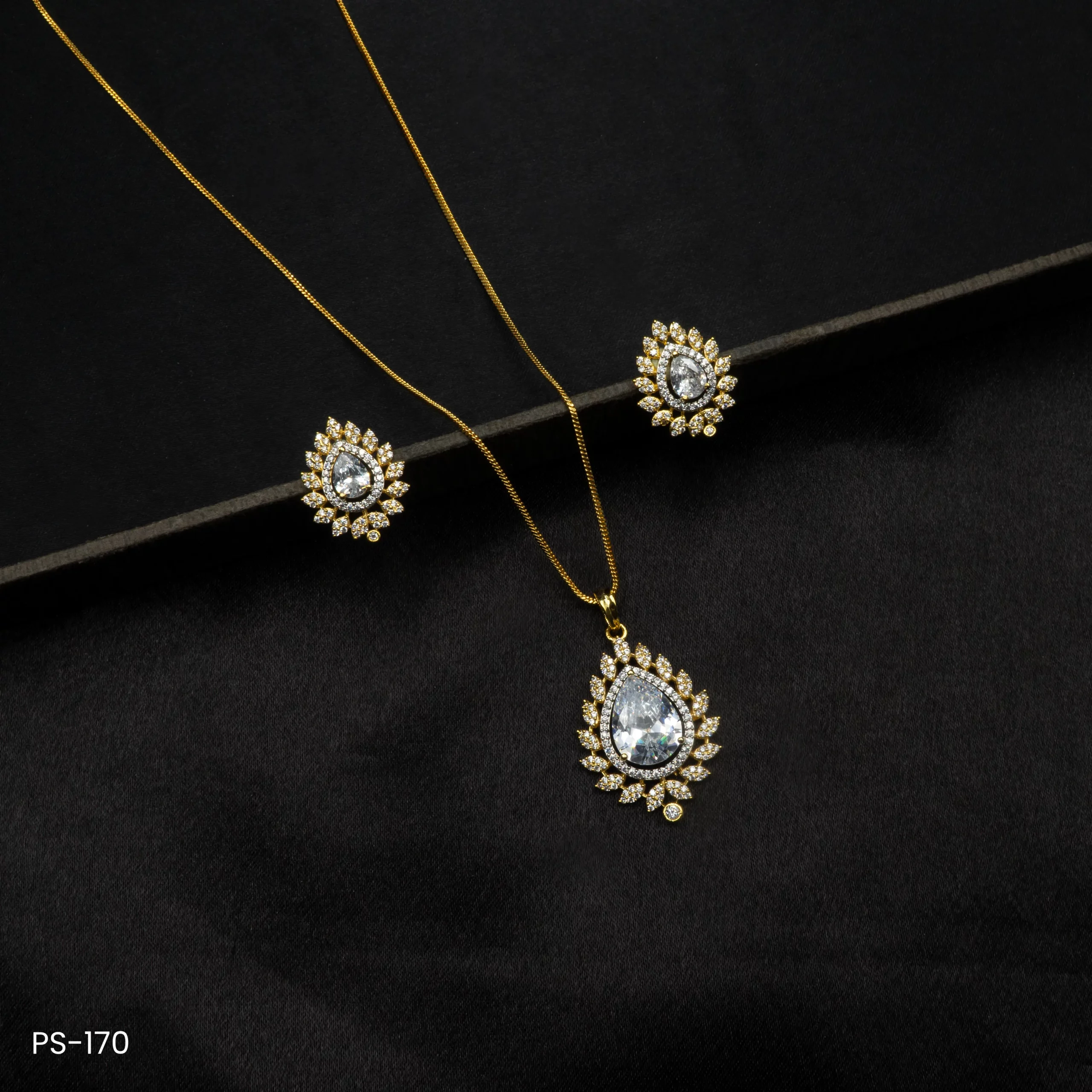 PS-170 - Graceful and Trendy Gold Plated American Diamond Teardrop Pendant Set PS-170 - Graceful and Trendy Gold Plated American Diamond Teardrop Pendant Set