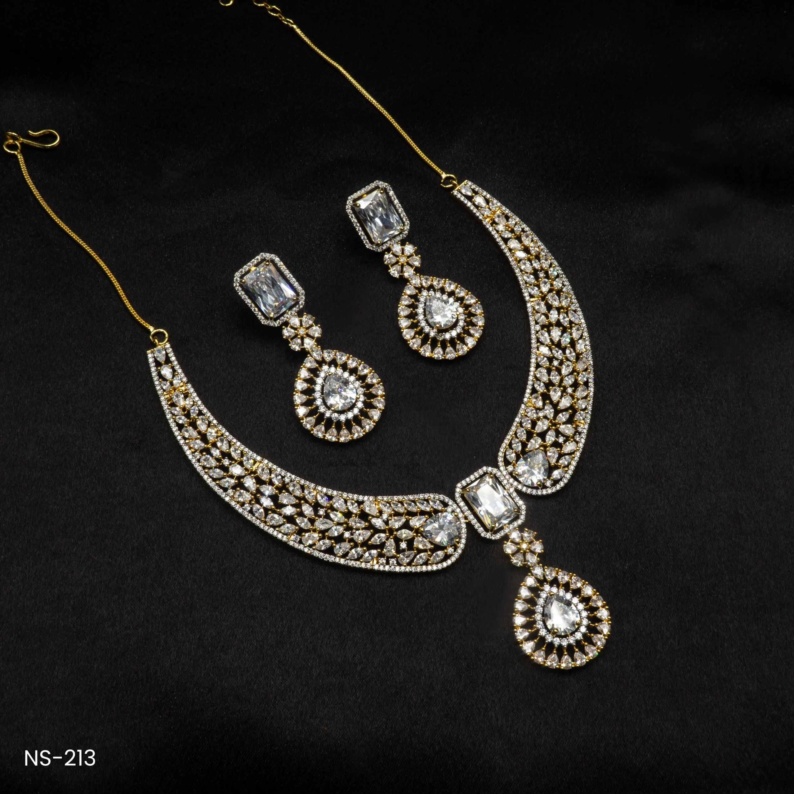 NS-213 - Elegant Party Wear Gold Plated Clear American Diamond Necklace Set NS-213 - Elegant Party Wear Gold Plated Clear American Diamond Necklace Set