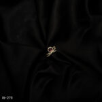 RI-279 - Gold Plated Twisted Elegance Ruby Glow American Diamond Adjustable Ring