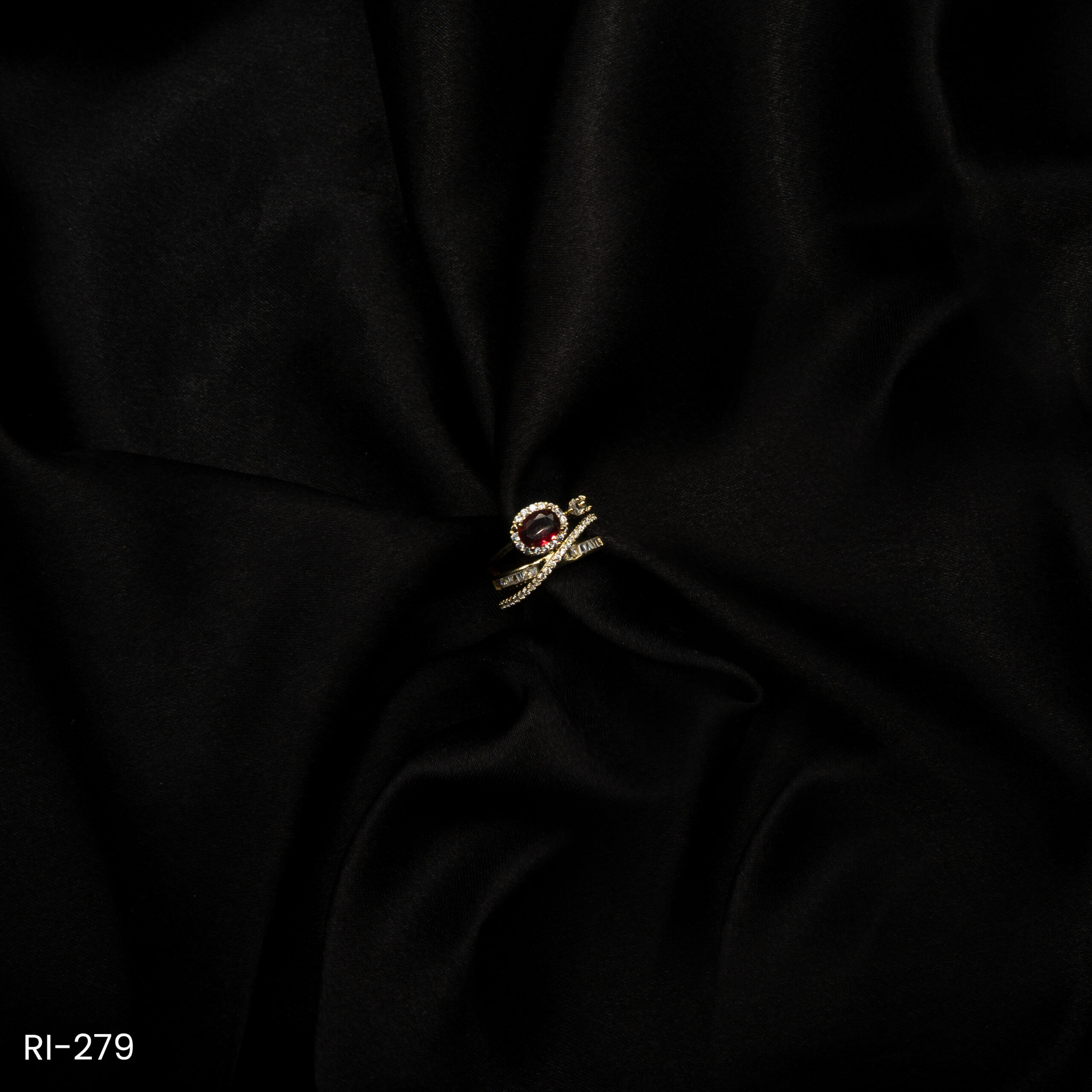 RI-279 - Gold Plated Twisted Elegance Ruby Glow American Diamond Adjustable Ring RI-279 - Gold Plated Twisted Elegance Ruby Glow American Diamond Adjustable Ring