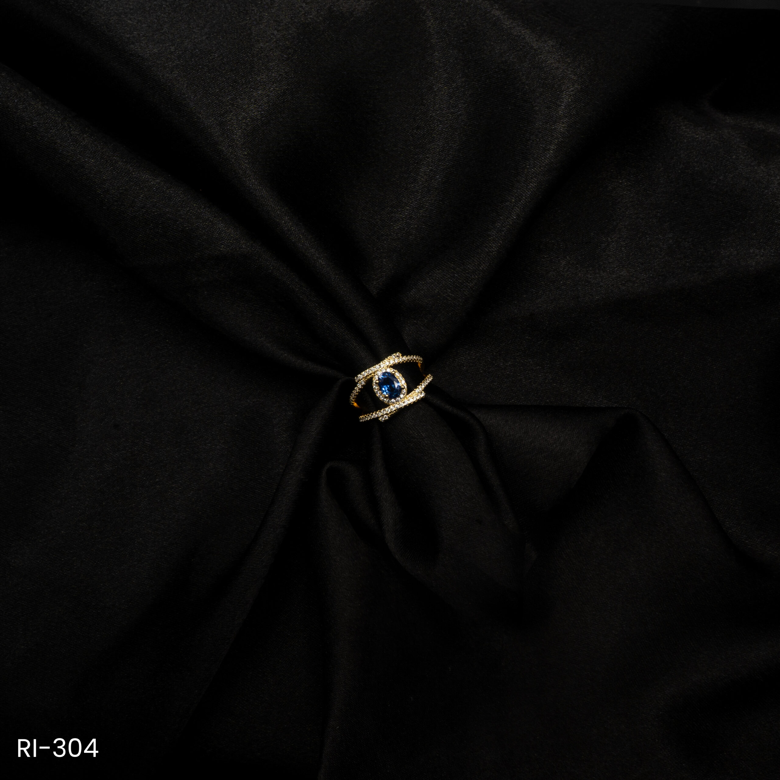 RI-304 - Marquise Magic American Diamond & Blue Gem Adjustable Finger Ring RI-304 - Marquise Magic American Diamond & Blue Gem Adjustable Finger Ring