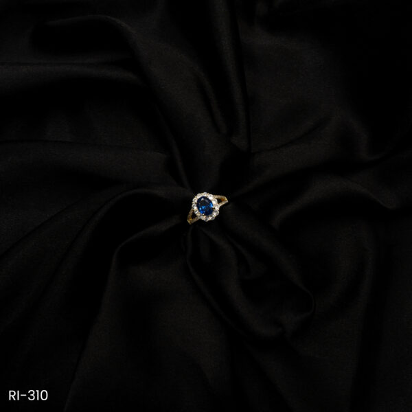 RI-310 - Sparkle with Elegance American Diamond & Royal Blue Oval Halo Ring